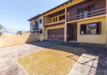 Casa em condomínio fechado com 3 quartos à venda na avenida ipê, 298, vila jardim, porto alegre, 192 m2 por r$ 900.000