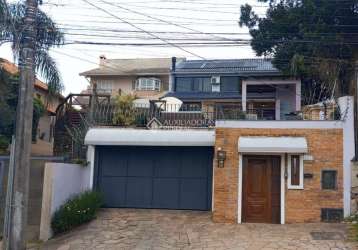 Casa em condomínio fechado com 3 quartos à venda na rua charruas, 257, espírito santo, porto alegre, 390 m2 por r$ 2.200.000