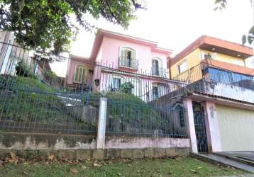 Casa em condomínio fechado com 4 quartos à venda na avenida silva paes, 1715, medianeira, porto alegre, 264 m2 por r$ 980.000