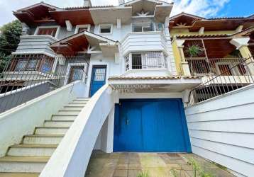 Casa com 4 quartos à venda na rua almirante mariath, 168, tristeza, porto alegre, 297 m2 por r$ 1.190.000