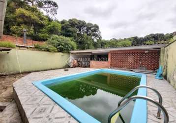 Casa em condomínio fechado com 3 quartos à venda na rua padre joão batista reus, 1315, vila conceição, porto alegre, 200 m2 por r$ 650.000