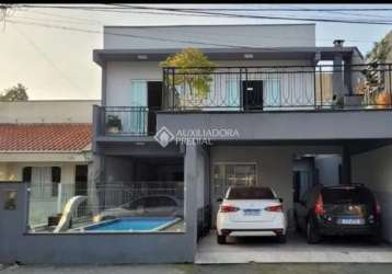 Casa em condomínio fechado com 4 quartos à venda na rua josé pereira liberato, 3170, são joão, itajaí, 260 m2 por r$ 890.000