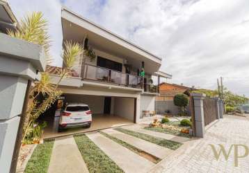 Casa com 4 quartos à venda na rua bom retiro, 600, nova brasília, joinville por r$ 1.700.000