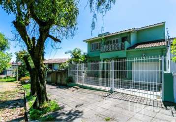 Casa com 4 quartos à venda na rua doutor rodrigues alves, 145, chácara das pedras, porto alegre, 300 m2 por r$ 1.158.000