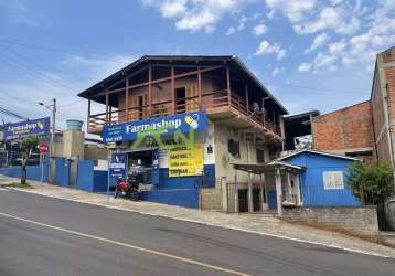 Prédio comercial de esquina com sala/loja térrea, casa no pavimento superior e chalé. esquina com av. presidente lucena, bairro união, estância velha