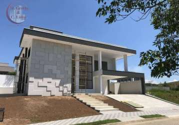 Casa, com arquitetura contemporânea, com 4 suítes,  460,85 m² por r$ 3.600.000 - condomínio reserva do paratehy - são josé dos campos/sp