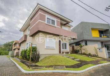 Casa em condomínio fechado com 4 quartos à venda na rua ivo walter kern, 599, hípica, porto alegre, 175 m2 por r$ 1.150.000