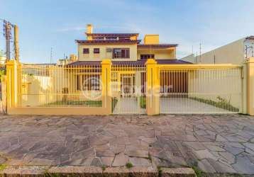 Casa com 4 quartos à venda na rua alfredo silveira dias, 15, nonoai, porto alegre, 350 m2 por r$ 1.100.000