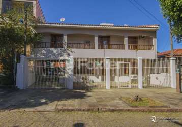 Casa com 4 quartos à venda na rua fonseca ramos, 127, medianeira, porto alegre, 400 m2 por r$ 1.350.000