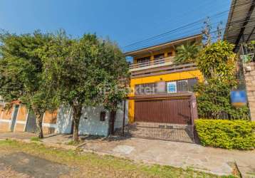 Casa com 3 quartos à venda na rua coronel ruy da cunha paim, 35, nonoai, porto alegre, 294 m2 por r$ 899.000