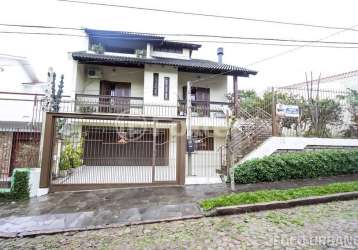 Casa com 3 quartos à venda na rua josé grimberg, 150, rubem berta, porto alegre, 266 m2 por r$ 750.000