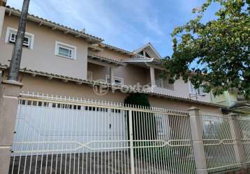 Casa com 3 quartos à venda na rua lagoa do peixe, 150, sarandi, porto alegre, 352 m2 por r$ 1.390.000