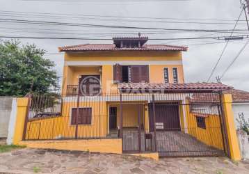 Casa com 4 quartos à venda na travessa clemêncio wallau, 24, coronel aparício borges, porto alegre, 484 m2 por r$ 740.000