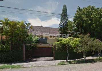 Casa com 3 quartos à venda na rua chavantes, 740, vila assunção, porto alegre, 265 m2 por r$ 2.130.000