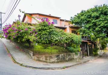 Casa com 5 quartos à venda na rua ângelo passuelo, 79, vila nova, porto alegre, 215 m2 por r$ 650.000