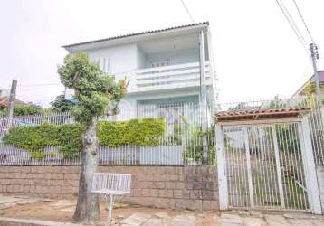 Casa com 2 quartos à venda na rua mathilde zatar, 157, nonoai, porto alegre, 135 m2 por r$ 650.000