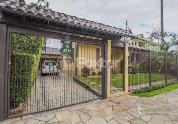 Casa com 3 quartos à venda na rua professor guerreiro lima, 585, partenon, porto alegre, 240 m2 por r$ 1.200.000