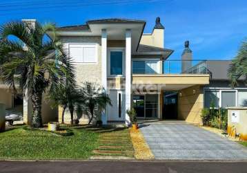 Casa em condomínio fechado com 4 quartos à venda na avenida paraguassú, s/n, atlântida sul (distrito), osório, 239 m2 por r$ 1.690.000