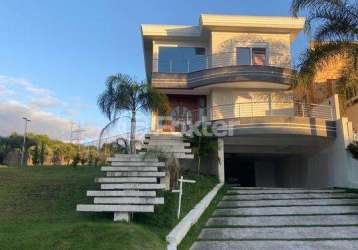 Casa em condomínio fechado com 4 quartos à venda na avenida senador salgado filho, 8500, vila augusta, viamão, 534 m2 por r$ 2.933.125