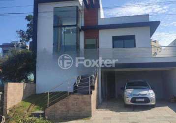 Casa em condomínio fechado com 3 quartos à venda na rua lino estácio dos santos, 1001, oriço, gravataí, 142 m2 por r$ 1.090.000