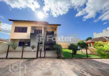 Casa com 3 quartos à venda na rua joão aluysio jacob, 381, fátima, canoas, 200 m2 por r$ 850.000