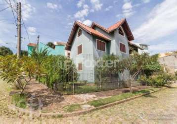 Casa com 4 quartos à venda na rua inês vinhas, 40, espírito santo, porto alegre, 220 m2 por r$ 1.060.000