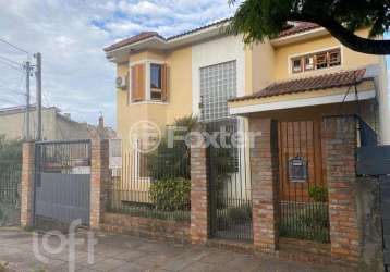 Casa com 3 quartos à venda na rua joaquim cruz, 130, santo antônio, porto alegre, 330 m2 por r$ 1.400.000