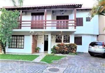 Casa em condomínio fechado com 3 quartos à venda na rua conrado ferrari, 71, jardim isabel, porto alegre, 211 m2 por r$ 800.000