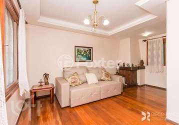 Casa com 3 quartos à venda na rua márcio dias, 196, nonoai, porto alegre, 214 m2 por r$ 850.000