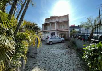 Casa com 4 quartos à venda na rua doutor constâncio krummel, 1257, praia comprida, são josé, 263 m2 por r$ 1.100.000