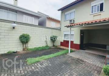 Casa em condomínio fechado com 3 quartos à venda na rua república, 2708, harmonia, canoas, 88 m2 por r$ 380.000