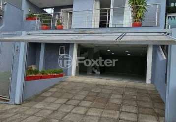 Casa em condomínio fechado com 4 quartos à venda na rua walter porto filho, 240, mário quintana, porto alegre, 284 m2 por r$ 895.000