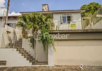 Casa comercial com 2 salas à venda na travessa miguel pereira, 131, medianeira, porto alegre, 224 m2 por r$ 695.000