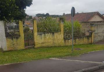 Terreno com casa não averbada à venda