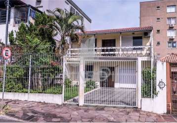 Casa com 2 quartos à venda na avenida grécia, 539, passo da areia, porto alegre por r$ 578.400