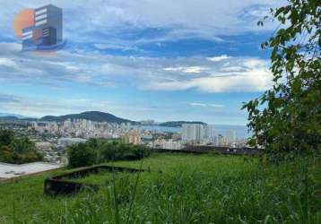 Terreno em condomínio fechado praia da enseada - guarujá/sp.