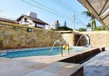 Linda casa excelente localização 05 dormitórios, piscina na enseada gjá.