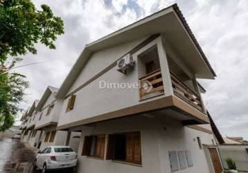 Casa em condomínio fechado com 3 quartos à venda na rua victor silva, 515, camaquã, porto alegre por r$ 750.000