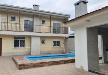 Casa com 4 quartos à venda na rua província de são pedro, 144, jardim dos lagos, guaíba por r$ 620.000