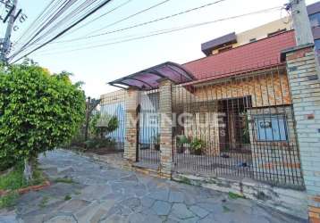 Casa com 5 quartos à venda na rua umbú, 566, passo da areia, porto alegre por r$ 1.350.000