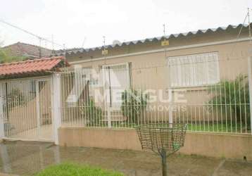 Casa com 3 quartos à venda na rua camoati, 48, santa maria goretti, porto alegre por r$ 750.000