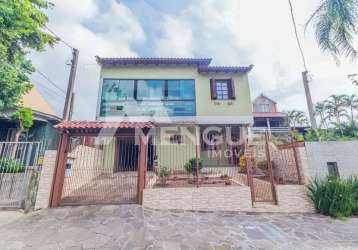 Casa com 4 quartos à venda na rua bento rosa, 242, sarandi, porto alegre por r$ 749.000