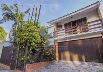 Casa com 4 quartos à venda na avenida panamericana, 940, jardim lindóia, porto alegre, 303 m2 por r$ 1.850.000