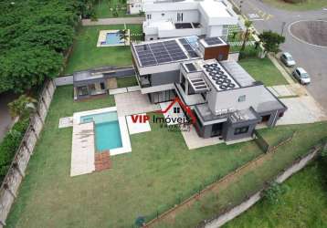 Excelente casa de alto padrão no condomínio terras caxambu com 400m² de área construída