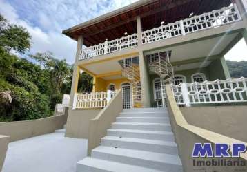 Casa com vista mar à venda na lagoinha em ubatuba, em condomínio, oportunidade.