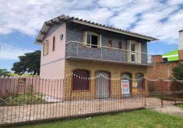 Sobrado com 2 lojas comerciais no térreo avenida rio grande do sul mathias velho