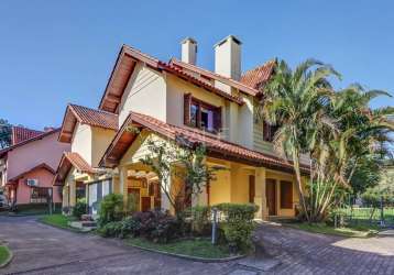 Casa em condomínio fechado com 3 quartos à venda na luís felipe monmany, 101, guarujá, porto alegre por r$ 650.000