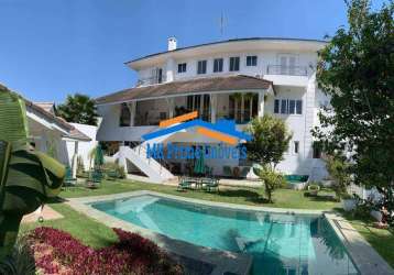 Casa com piscina de alto padrão em condomínio na granja viana.