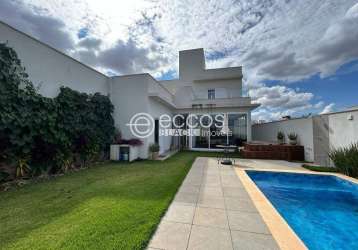 Casa em condomínio à venda, 4 quartos, 4 suítes, 5 vagas, laranjeiras - uberlândia/mg