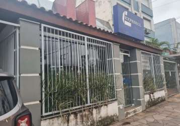 Casa  comercial com garagem,  medindo aproximadamente 500 m², situado na  av. plínio brasil milano.